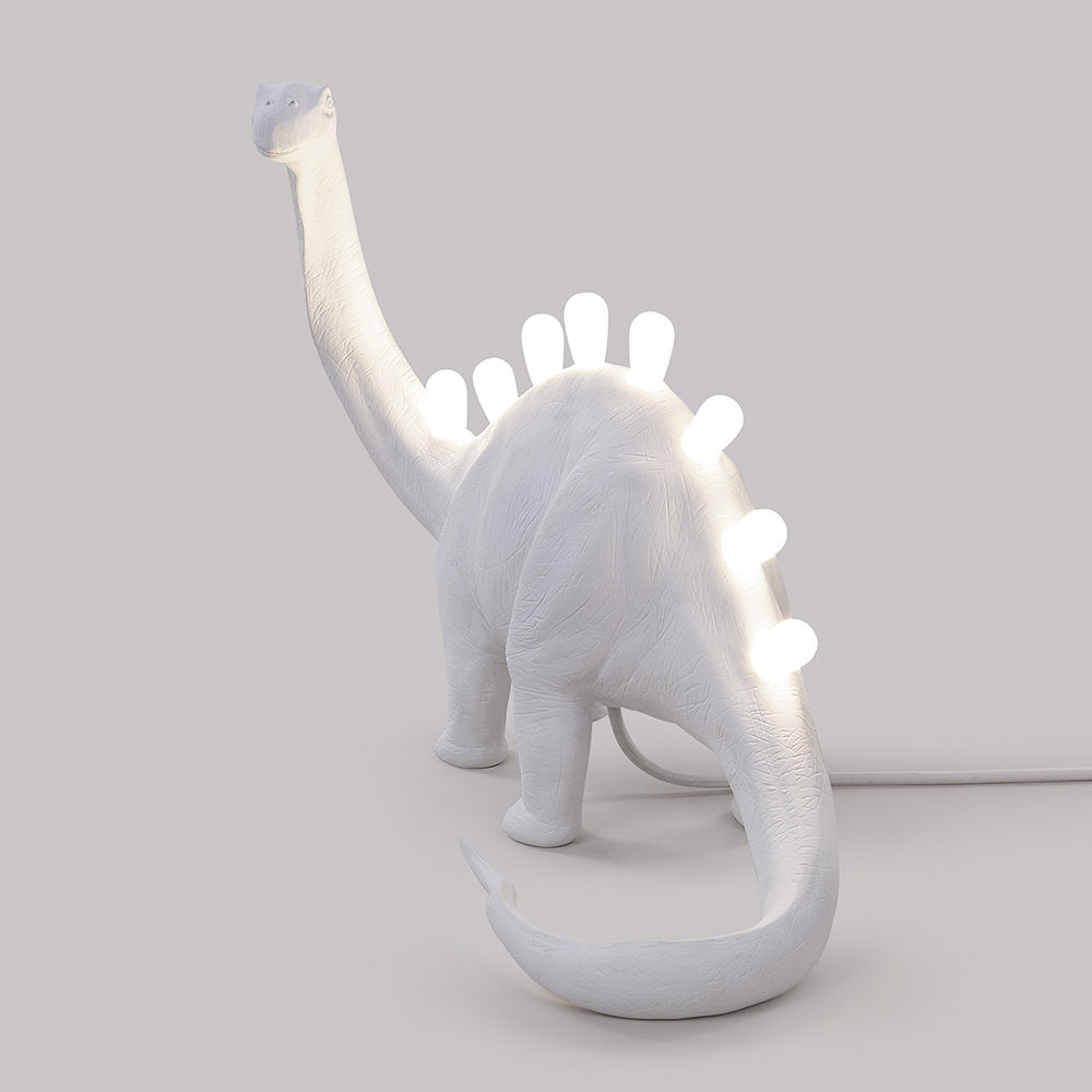 DinoLite™ Tischlampe – Kreative Design-Lampe mit beleuchtetem Dinosaurier-Rücken