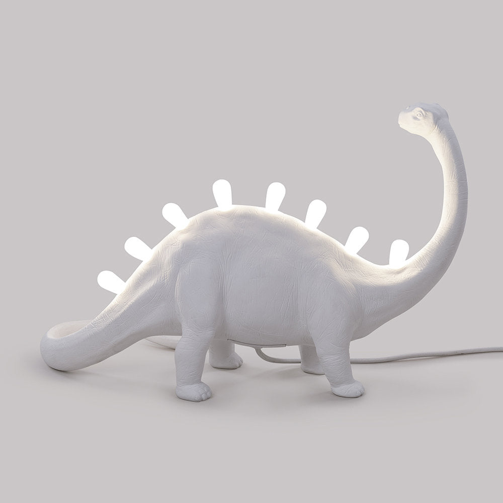 DinoLite™ Tischlampe – Kreative Design-Lampe mit beleuchtetem Dinosaurier-Rücken