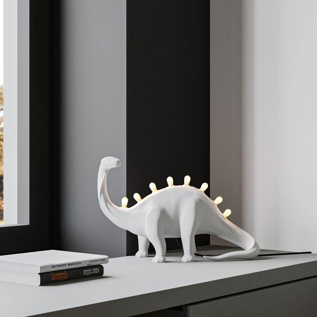 DinoLite™ Tischlampe – Kreative Design-Lampe mit beleuchtetem Dinosaurier-Rücken