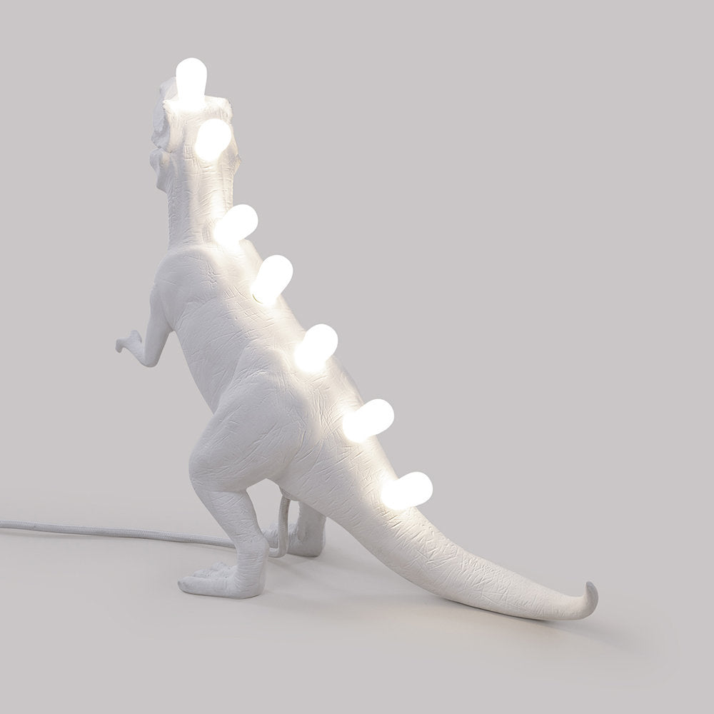 DinoLite™ Tischlampe – Kreative Design-Lampe mit beleuchtetem Dinosaurier-Rücken